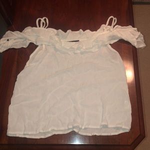 A Kendall and Kylie white cold shoulder top!